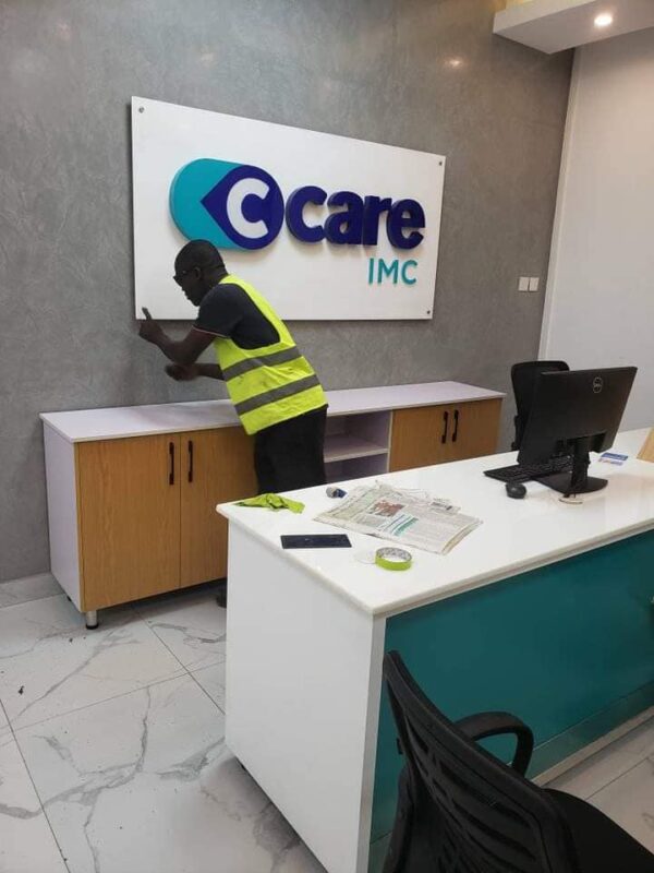 care wall logo installation reception siign